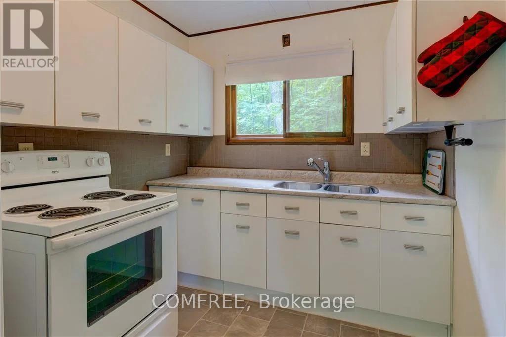199 West Devil Lake Lane, Frontenac, Ontario  K0H 2T0 - Photo 11 - X12344325