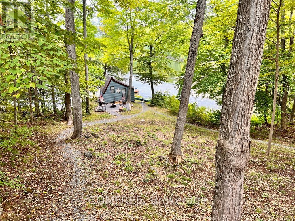 199 West Devil Lake Lane, Frontenac, Ontario  K0H 2T0 - Photo 18 - X12344325
