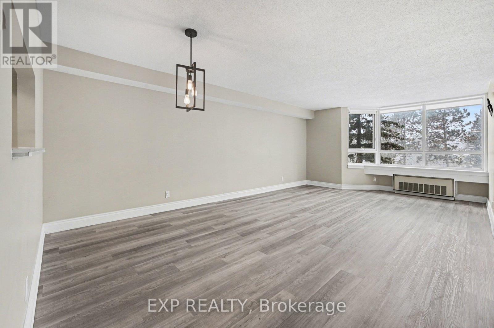 404 - 80 Sandcastle Drive, Ottawa, Ontario  K2H 9E7 - Photo 3 - X12980120