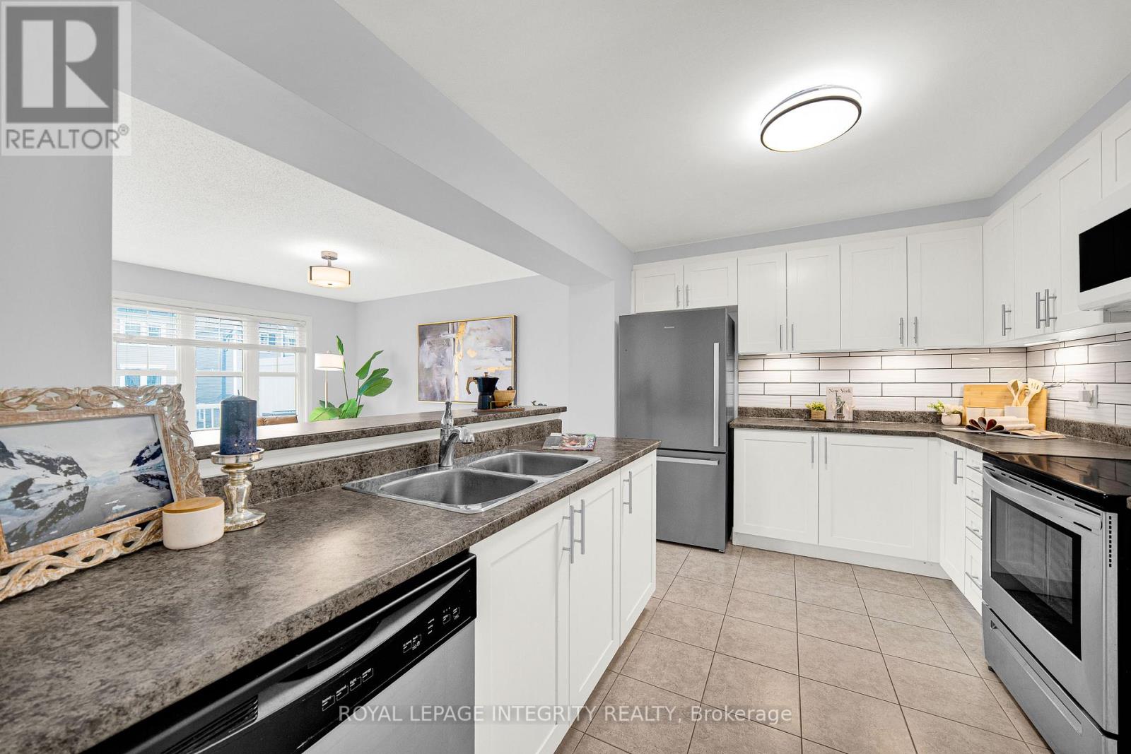 311 Pumpkinseed Crescent, Ottawa, Ontario  K2J 6J9 - Photo 6 - X13481456